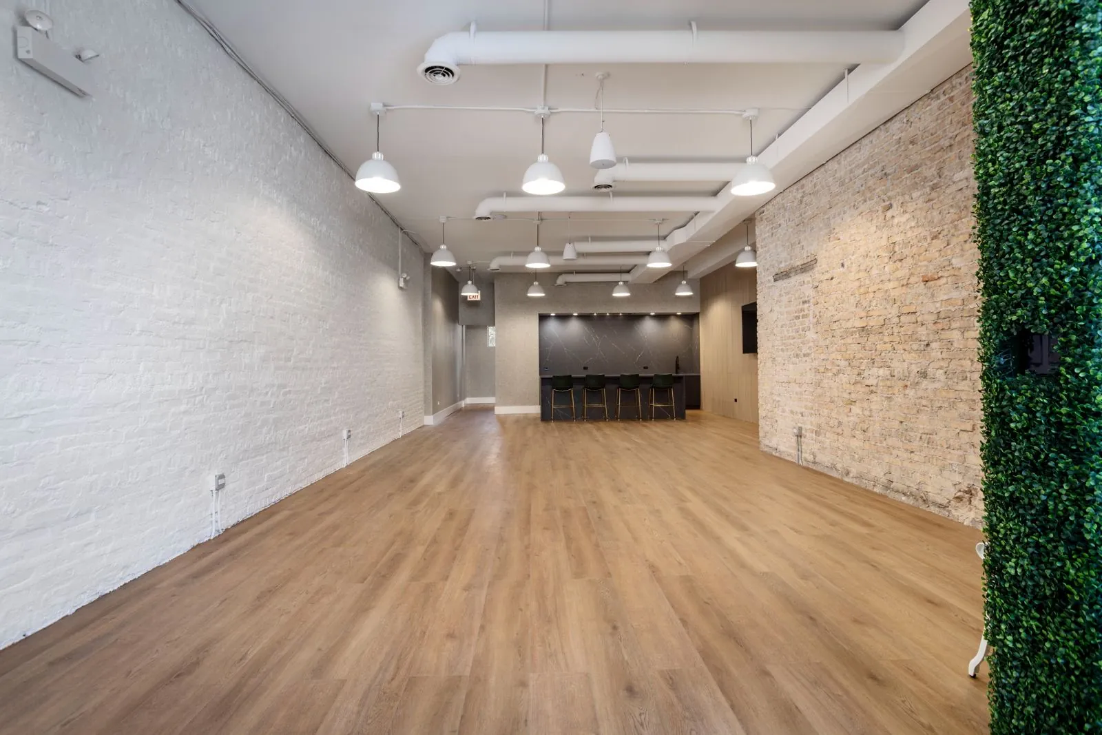View down the open room toward the kitchen island