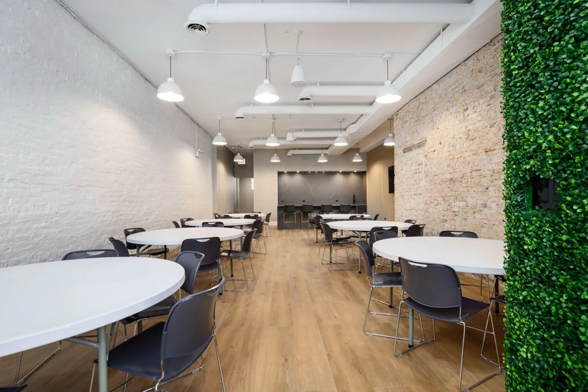 Round tables running toward the kitchen island